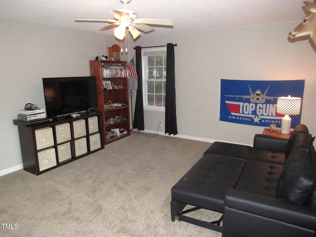 carpeted living room featuring ceiling fan