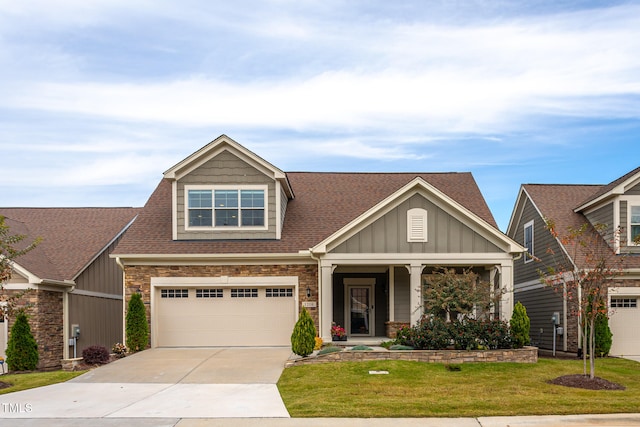 craftsman-style house with a front lawn and a garage