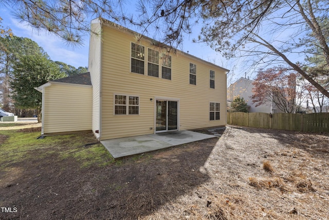 back of property featuring a patio