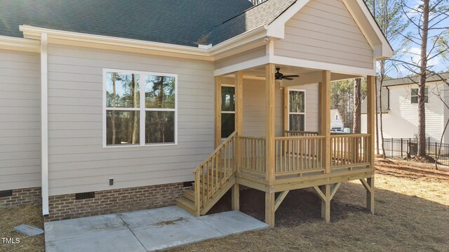 doorway to property featuring ceiling fan