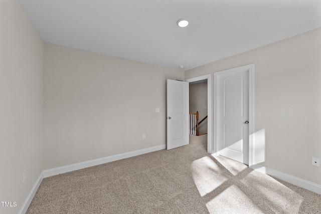 unfurnished bedroom with carpet