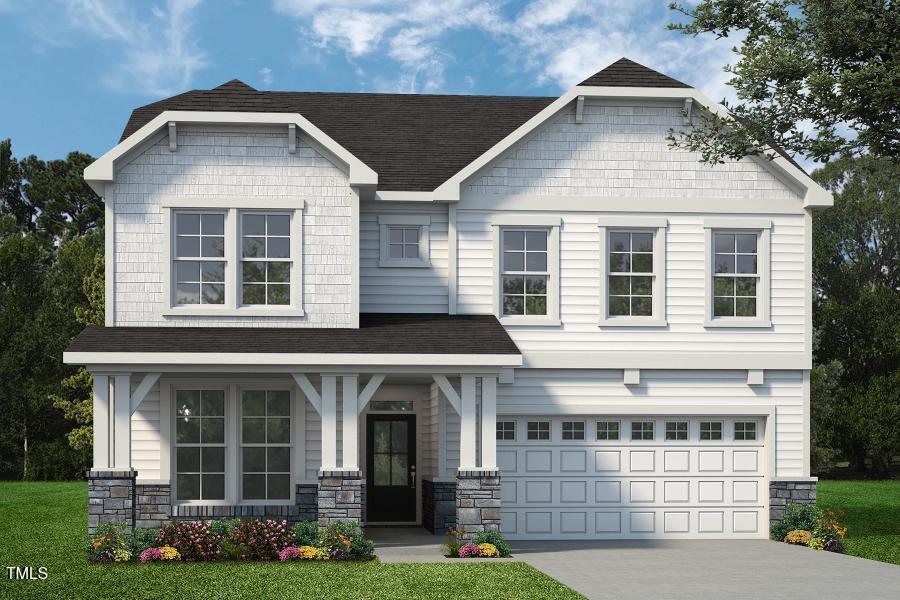 craftsman inspired home featuring a garage