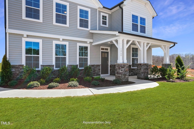 view of front of home with a front yard