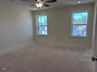 empty room featuring ceiling fan, recessed lighting, and baseboards