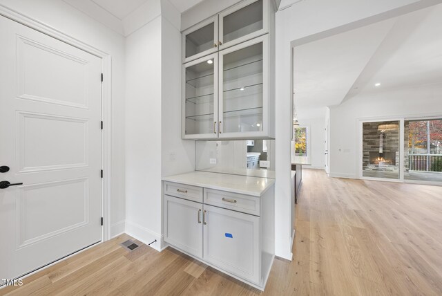 2637 Trifle Ln, Wake Forest, NC 27587 - bar area featuring light wood finished floors, baseboards, and recessed lighting