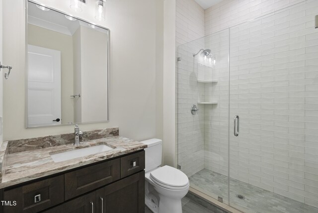 2637 Trifle Ln, Wake Forest, NC 27587 - bathroom featuring vanity, a shower stall, and toilet