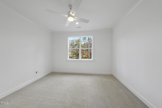 2637 Trifle Ln, Wake Forest, NC 27587 - unfurnished room featuring crown molding, ceiling fan, baseboards, and light carpet