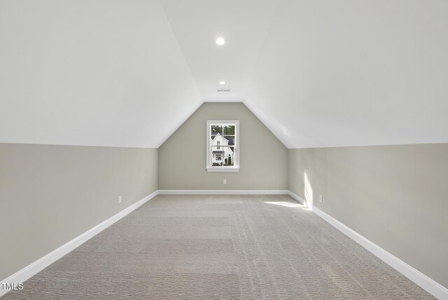 2637 Trifle Ln, Wake Forest, NC 27587 - bonus room with lofted ceiling, carpet floors, baseboards, and recessed lighting