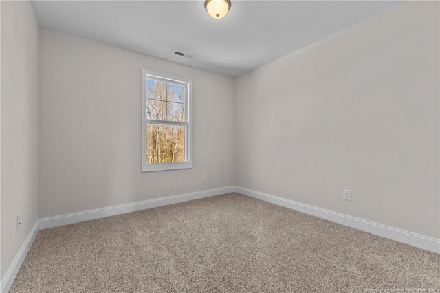 view of carpeted spare room