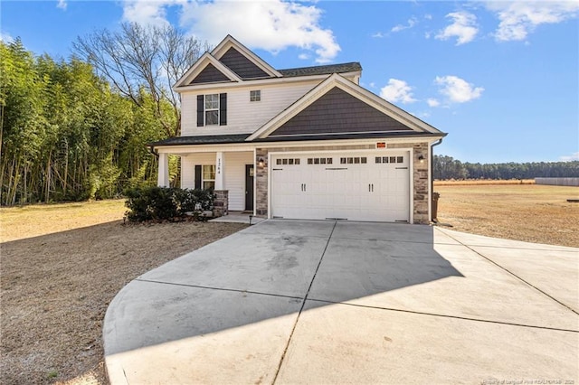 craftsman house featuring a garage