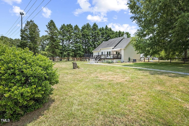 view of yard with a deck