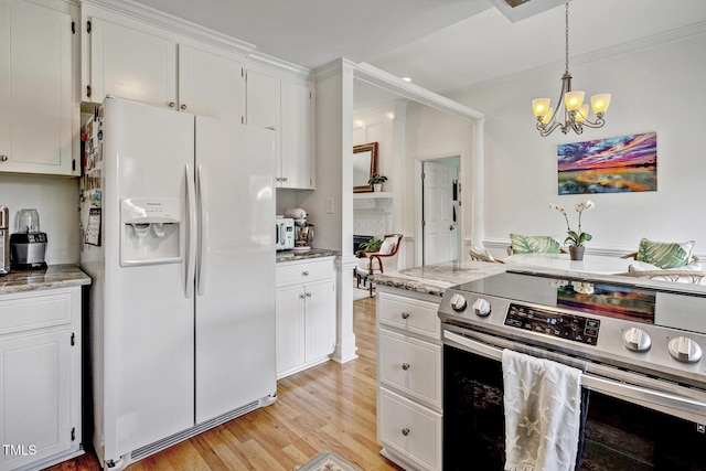 kitchen with white refrigerator with ice dispenser, light wood-type flooring, electric range, and white cabinets