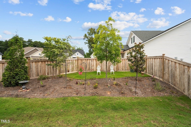 view of yard featuring a fenced backyard