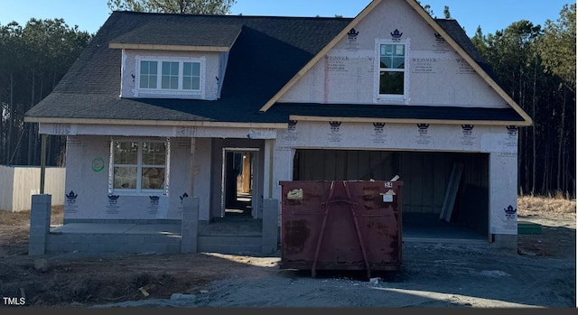 unfinished property featuring a porch