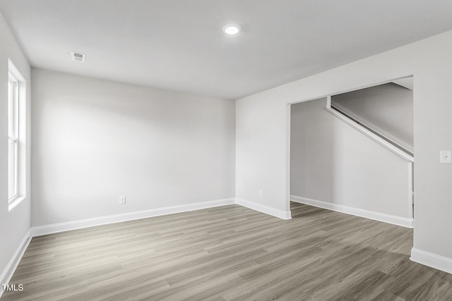 empty room featuring hardwood / wood-style floors