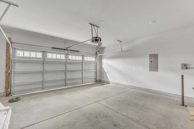 garage featuring a garage door opener and electric panel