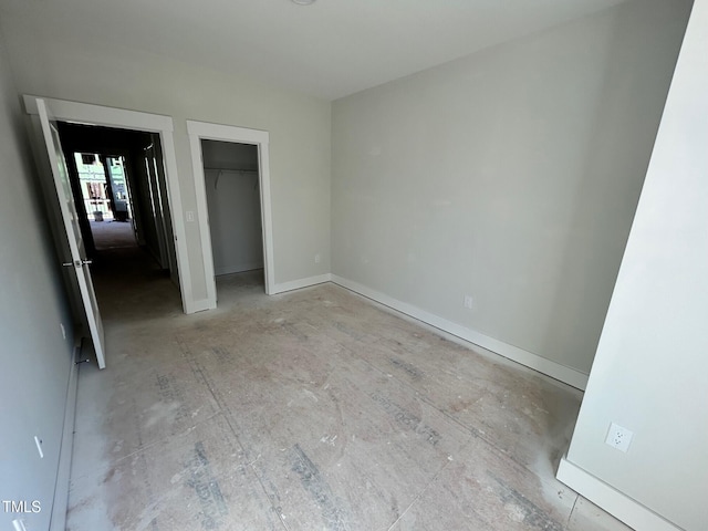 unfurnished bedroom featuring a closet