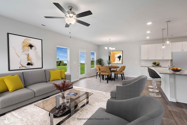 8816 Melvin St Unit 15-, Smithfield, Willow Springs, NC 27592 - living area with wood finished floors, a chandelier, recessed lighting, baseboards, and a ceiling fan