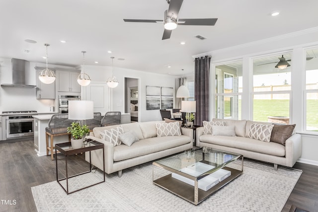 living room with recessed lighting, visible vents, baseboards, ornamental molding, and dark wood finished floors