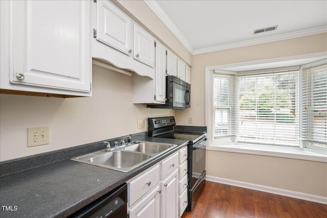 kitchen featuring sink, dark hardwood / wood-style floors, white cabinets, black appliances, and ornamental molding