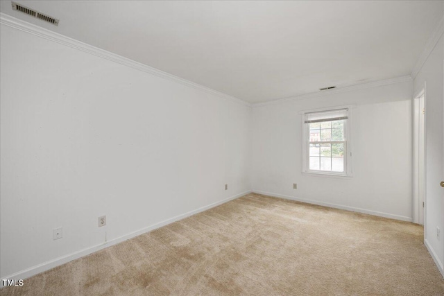 carpeted empty room with ornamental molding