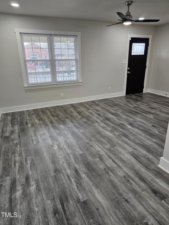 entryway featuring dark hardwood / wood-style floors and ceiling fan