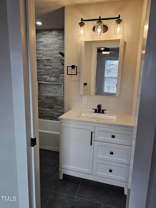 bathroom featuring vanity, shower / bath combination, and tile patterned floors