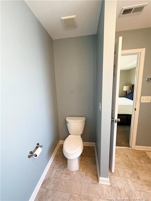 bathroom featuring toilet