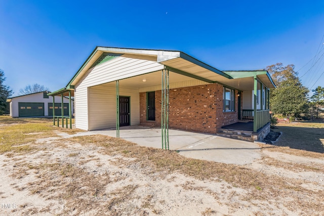 exterior space with a carport