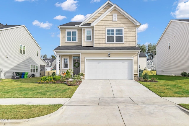 view of front of home with a garage and a front yard