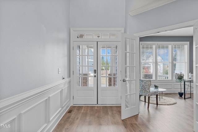 doorway to outside featuring a wealth of natural light and french doors