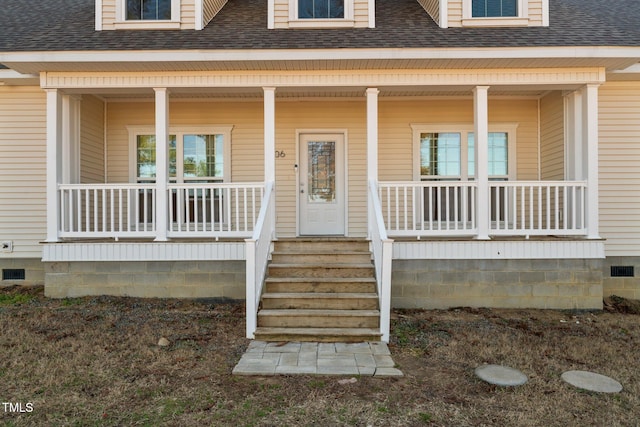 property entrance with covered porch