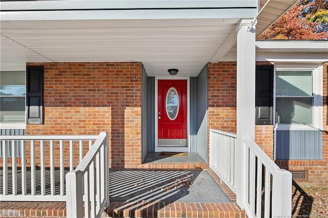 entrance to property with a porch