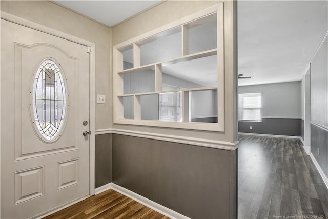 foyer entrance with dark hardwood / wood-style floors and ceiling fan