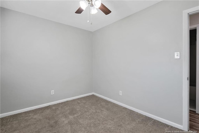 empty room with carpet and ceiling fan