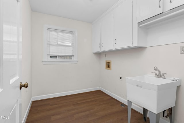 1204 Breedlove Rd, Nashville, NC 27856 - laundry room featuring cabinet space, hookup for a washing machine, baseboards, wood finished floors, and hookup for an electric dryer