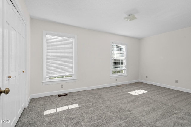 1204 Breedlove Rd, Nashville, NC 27856 - unfurnished bedroom with carpet, a closet, and baseboards