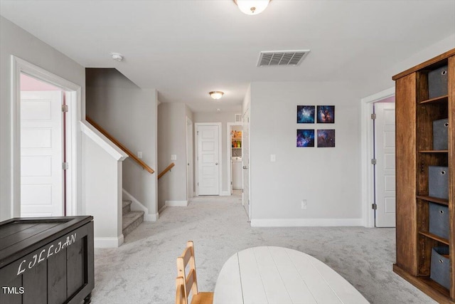 interior space with light colored carpet