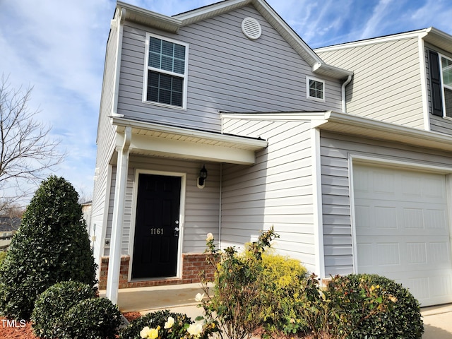 view of front of home featuring a garage