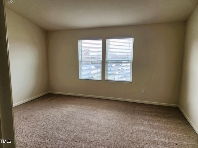 spare room with carpet flooring