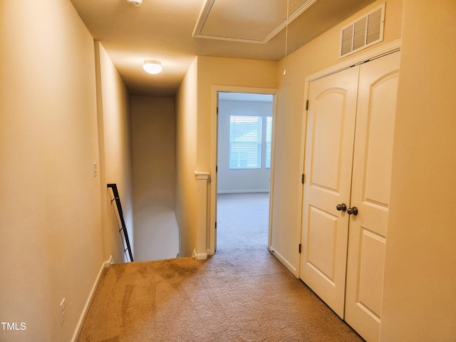 corridor with carpet floors