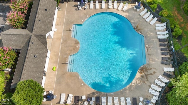 view of swimming pool featuring a patio area