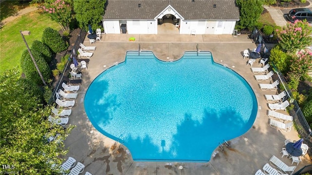 view of swimming pool featuring a patio area