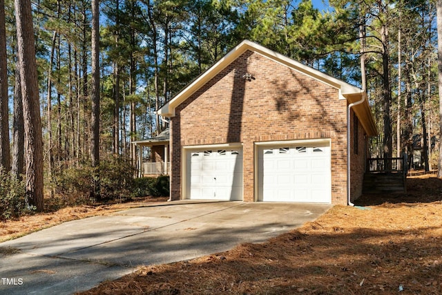 view of side of property featuring a garage