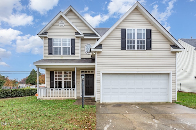 front of property with covered porch, a garage, and a front lawn