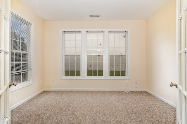 2124 Star Sapphire Dr, Raleigh, NC 27610 - carpeted empty room with baseboards