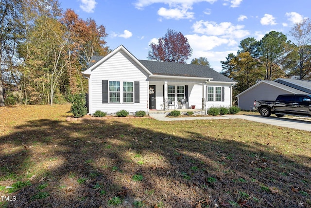 ranch-style home featuring a porch and a front lawn