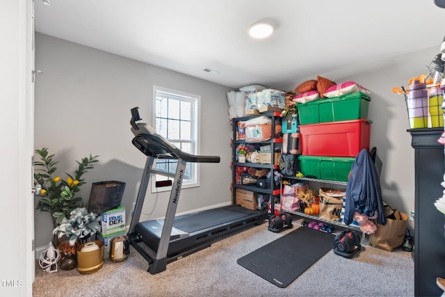 exercise room with carpet floors