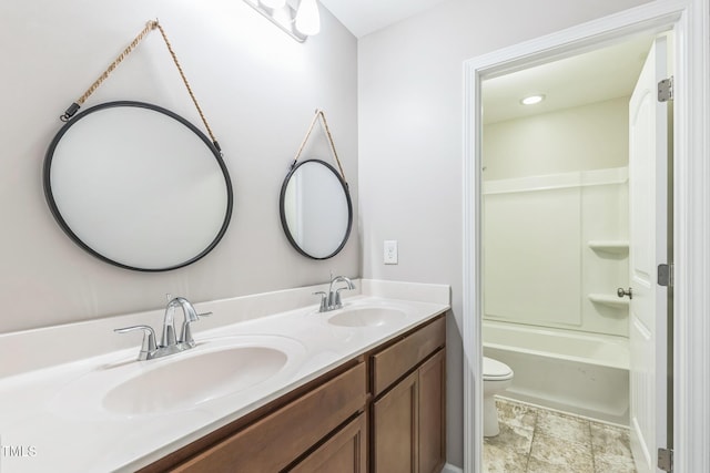 full bathroom with vanity, toilet, and bathing tub / shower combination