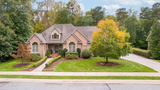 view of front of home featuring a front lawn